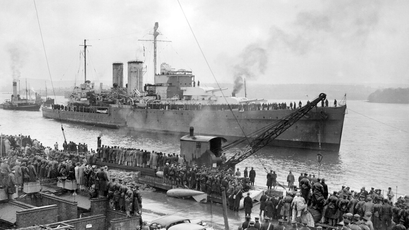 HMS Exeter (68) entering Plymouth on 14 February 1940 after returning from the Battle of the River Plate, December 1939, with damage repairs initially carried out at Stanley in the Falkland Islands