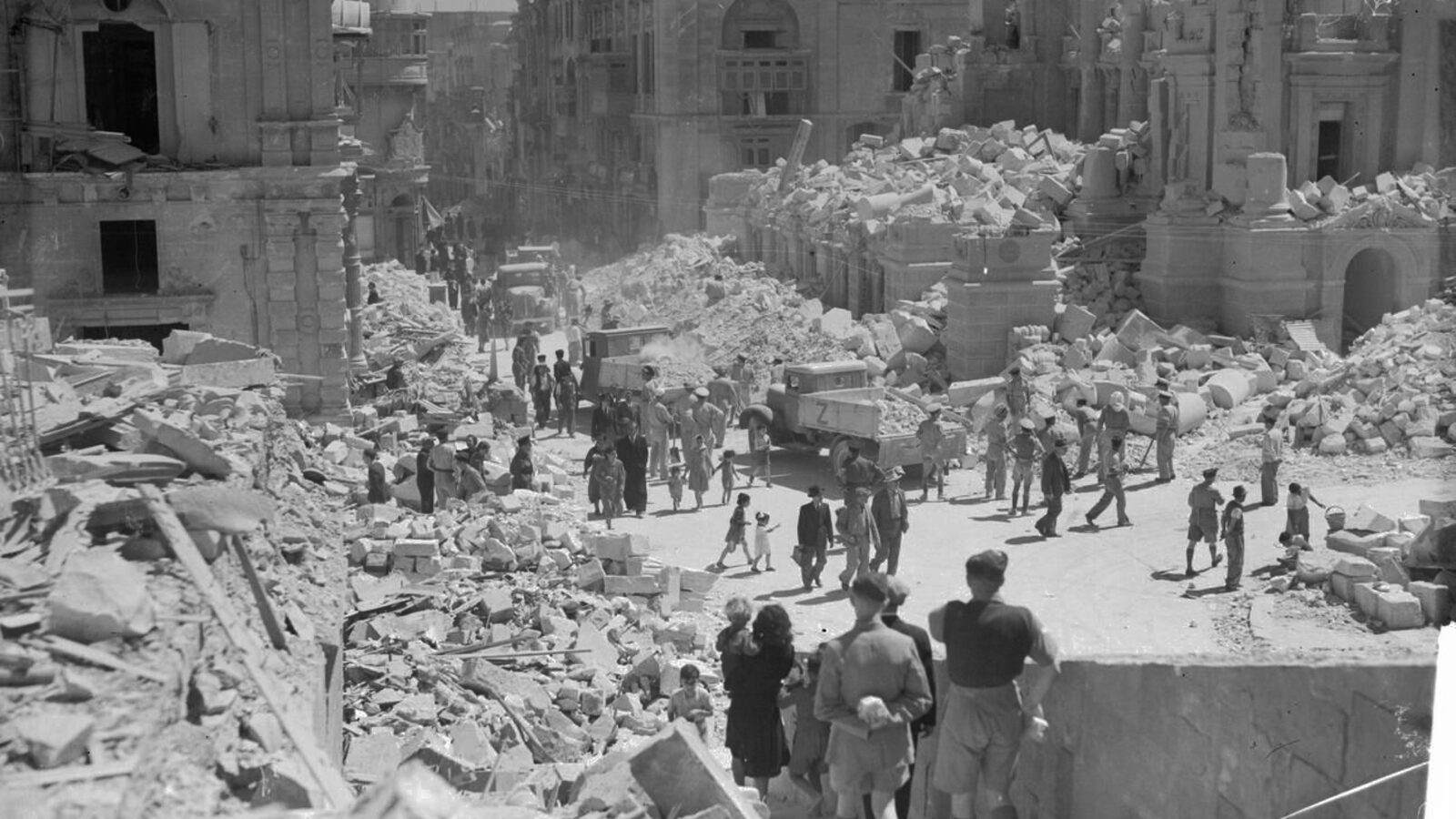 Service personnel and civilians clearing bomb damage on Kingsway, Valletta, during the Siege of Malta, April 1942