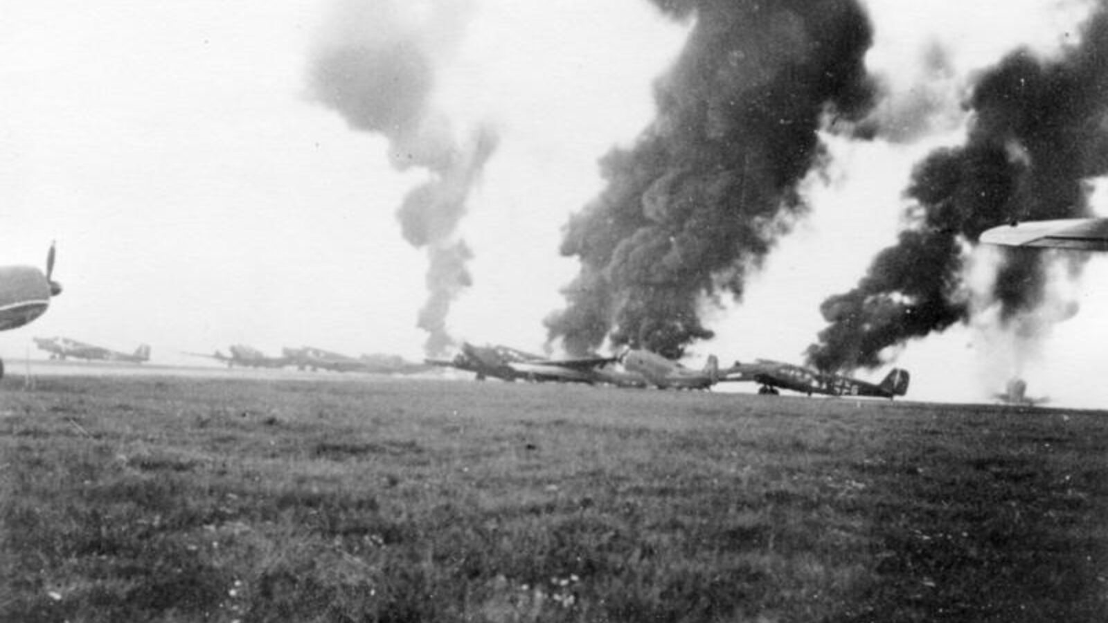 Burning German Junkers Ju 52 transport aircraft at Ypenburg airfield near The Hague after the failed German airborne assault, May 10, 1940