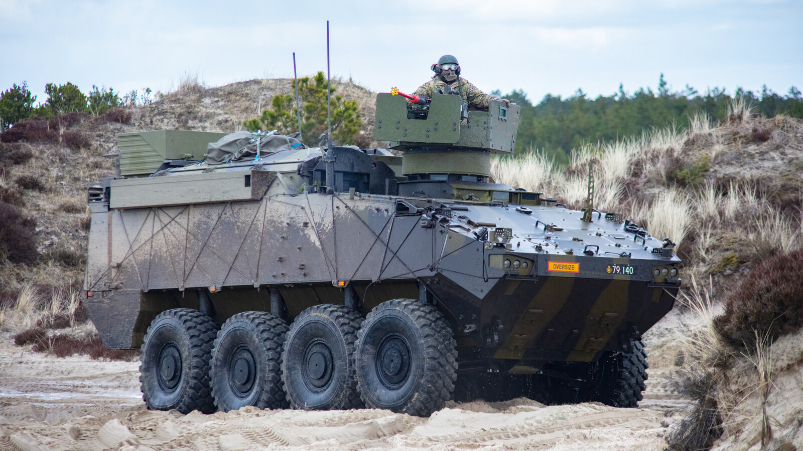 A Danish Piranha V armored personnel carrier during NATO Exercise Dynamic Front 23 at Oksbøl, Denmark, March 2023
