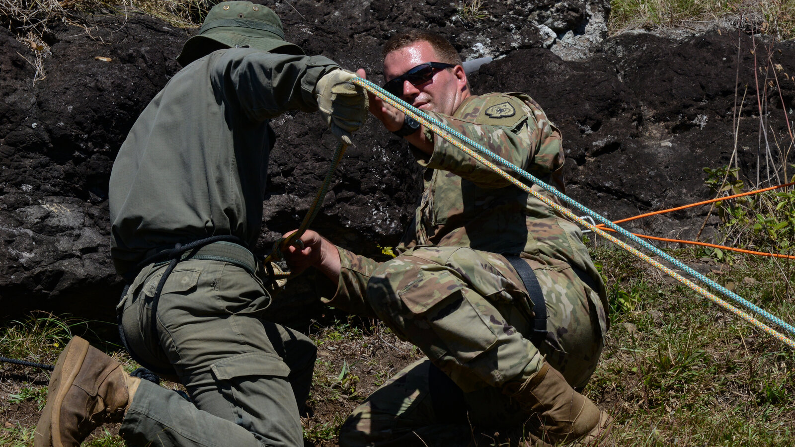 Nevada Army National Guard rappel master instructs a Fiji military forces soldier in the Nausori Highlands during Exercise Cartwheel 2024, September 2024