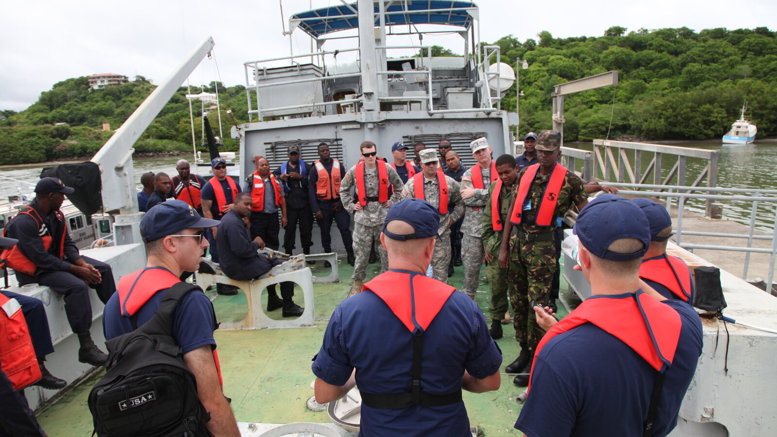 Multinational naval personnel during a risk-assessment brief at Saint George's, Grenada, ahead of TRADEWINDS 2016 maritime training, June 2016