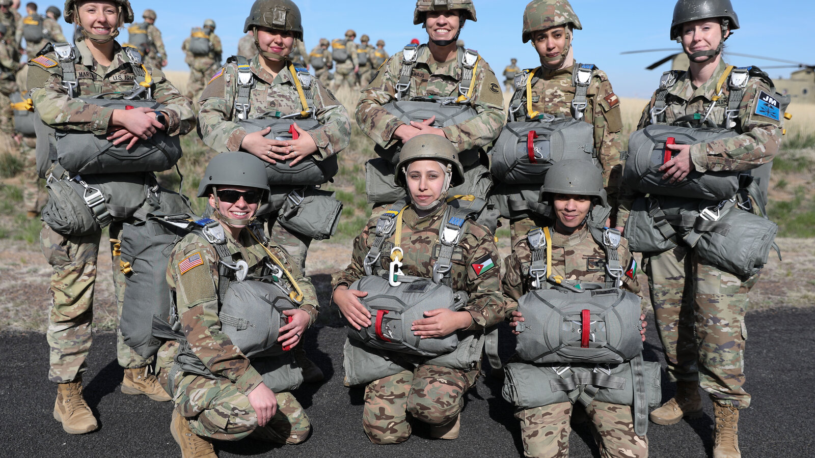 Paratroopers from the Colorado Army National Guard and the Jordanian Armed Forces before the first joint Colorado-Jordan airborne Friendship Jump, Watkins, Colorado, April 2025