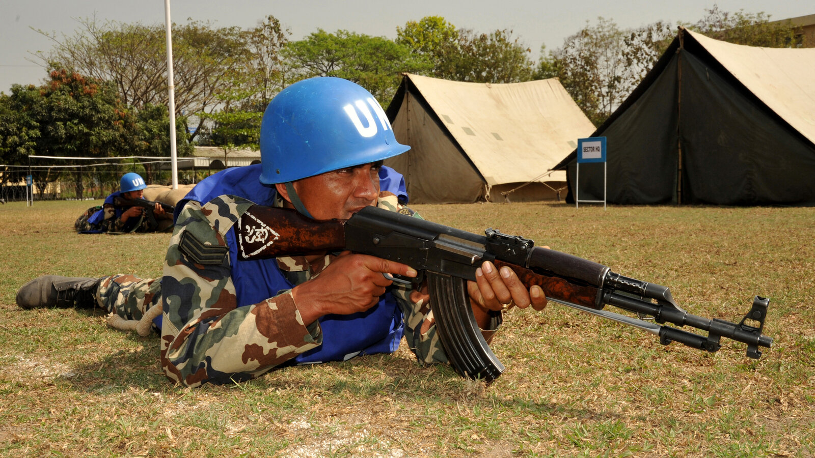 Nepalese Army Cpl. Bishnu Prasad Dhakal in a defensive position at a simulated UN compound during Exercise Shanti Doot 3 in Gazipur, Bangladesh, March 2012