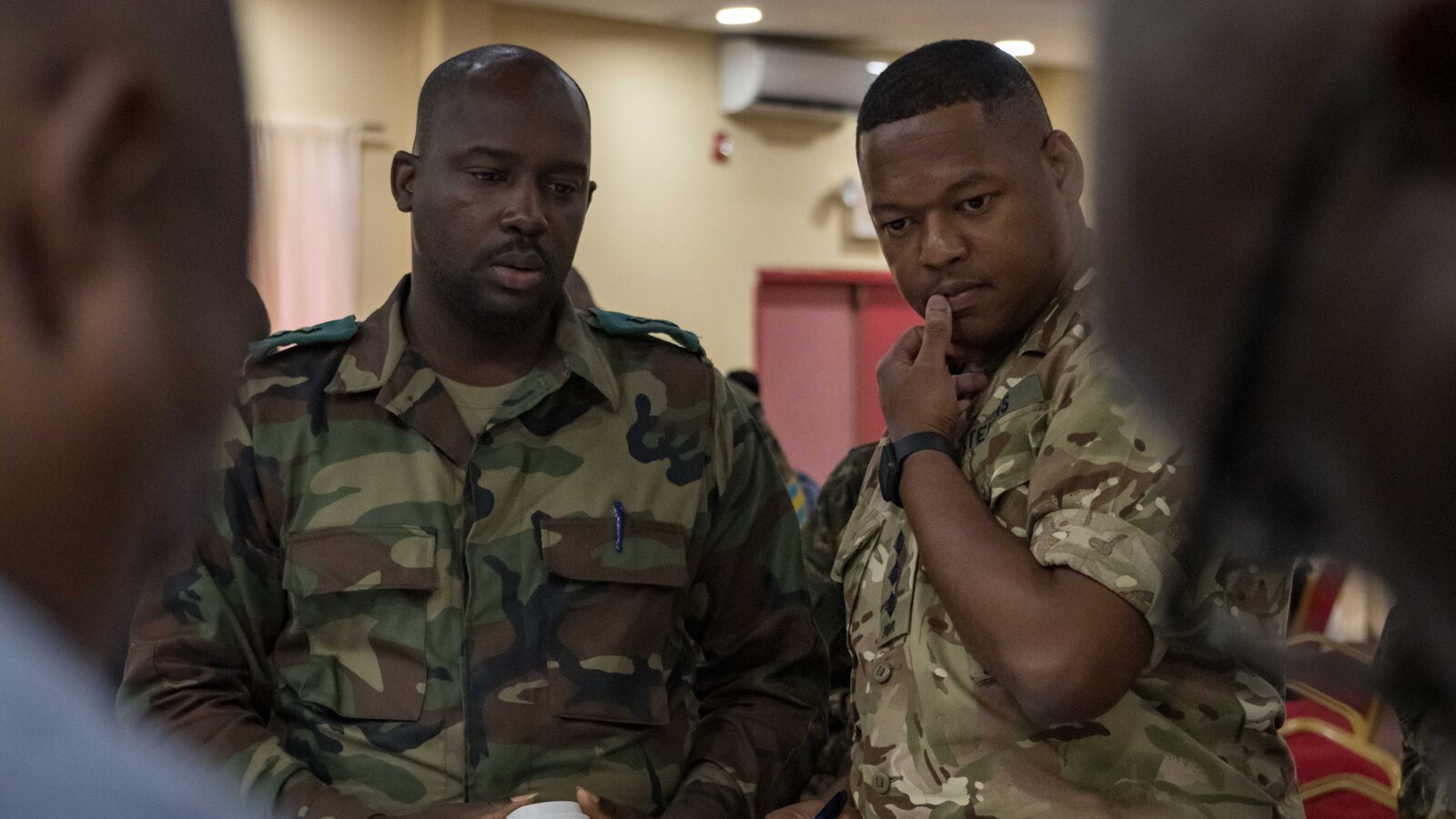 Saint Kitts and Nevis Defence Force member and Royal Bermuda Regiment member on Canadian-led wargame training at Exercise TRADEWINDS 23, Georgetown, Guyana, July 2023