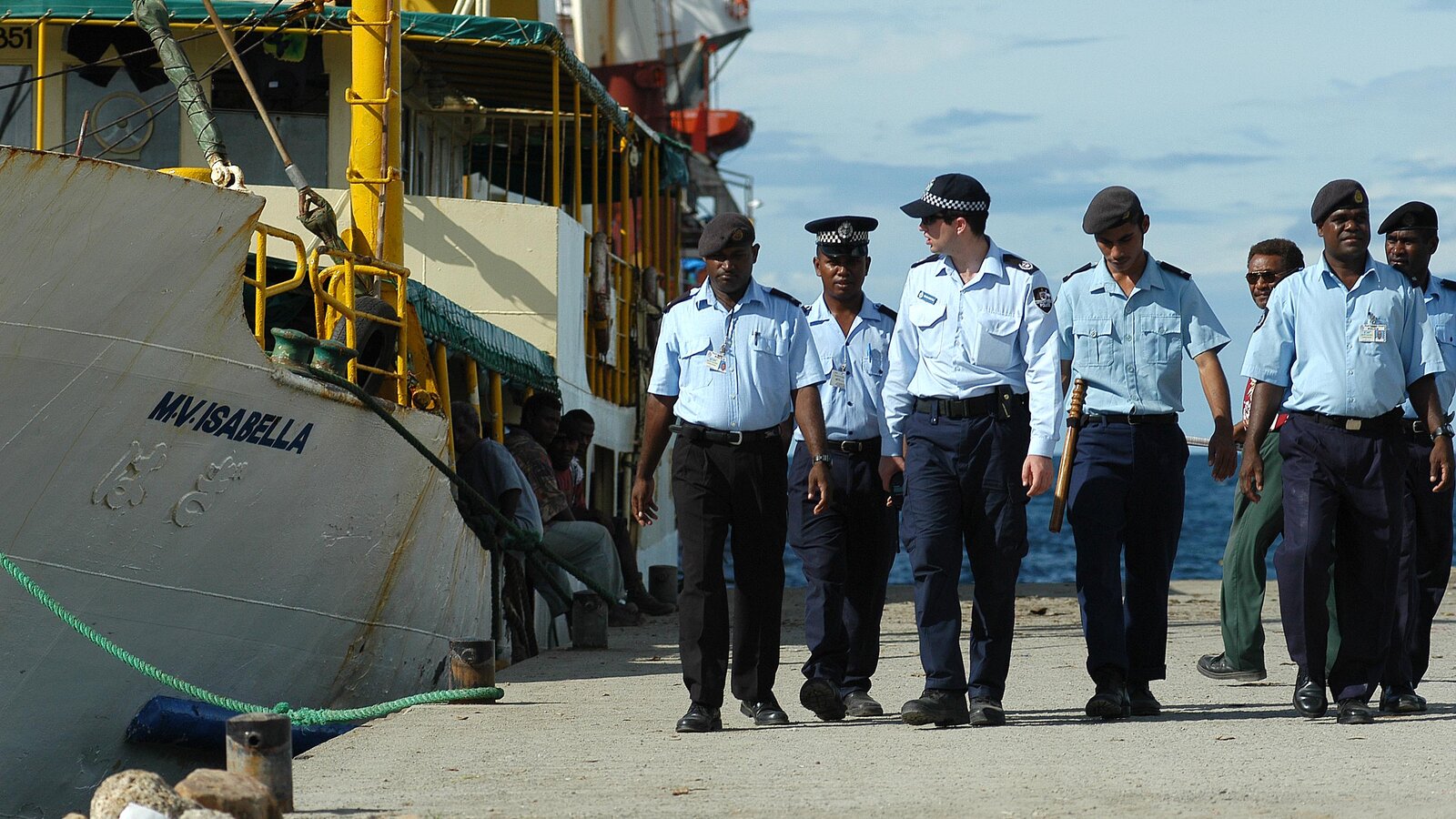 RAMSI and Royal Solomon Islands Police patrol Honiara waterfront, Solomon Islands, August 2003