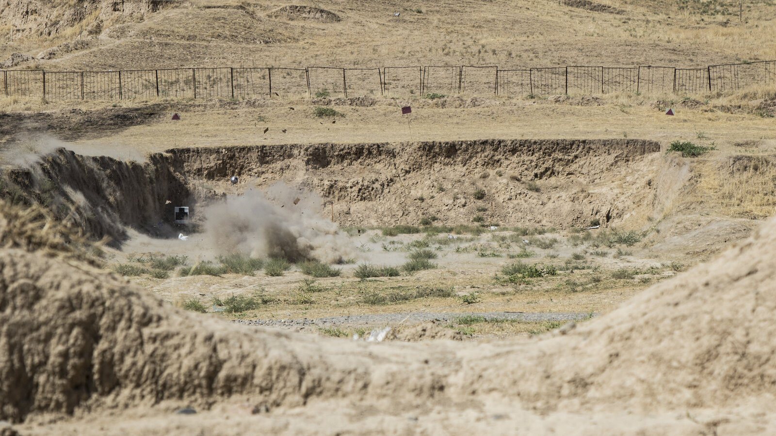 U.S. Army humanitarian mine action certification course training in Tajikistan with explosives detonating, September 2016