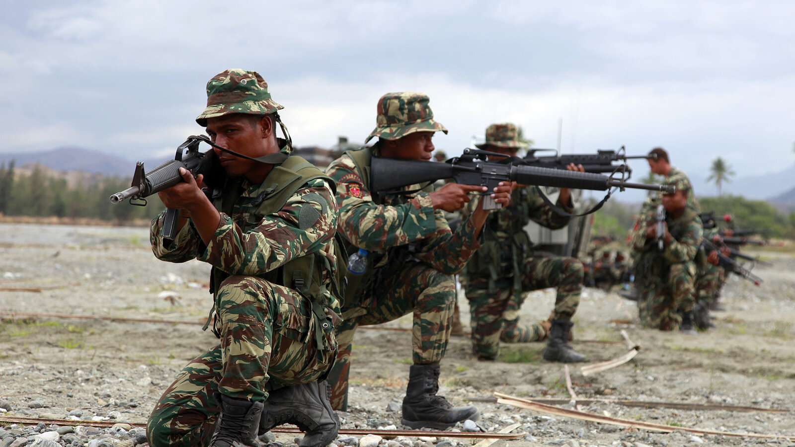 Timor-Leste Defense Force soldiers practice infantry tactics during Exercise Crocodilo 2012 with U.S. Marines from BLT 3/5, October 2012
