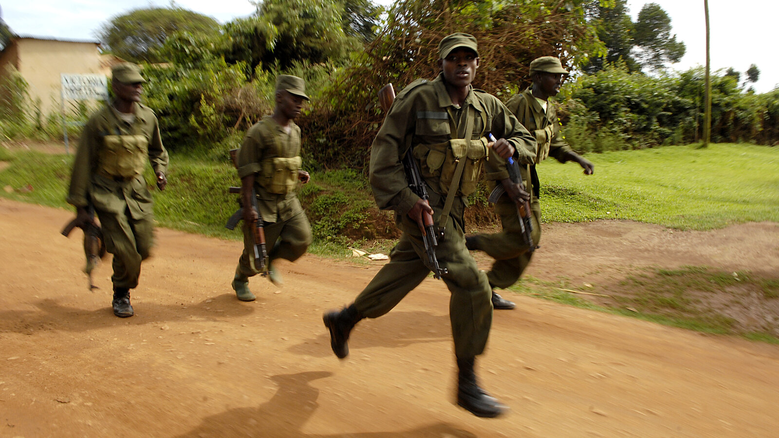 Uganda People's Defence Force soldiers running a 5.4-mile squad competition with the U.S. 1-3 Infantry (Old Guard) at Kasenyi, April 2008